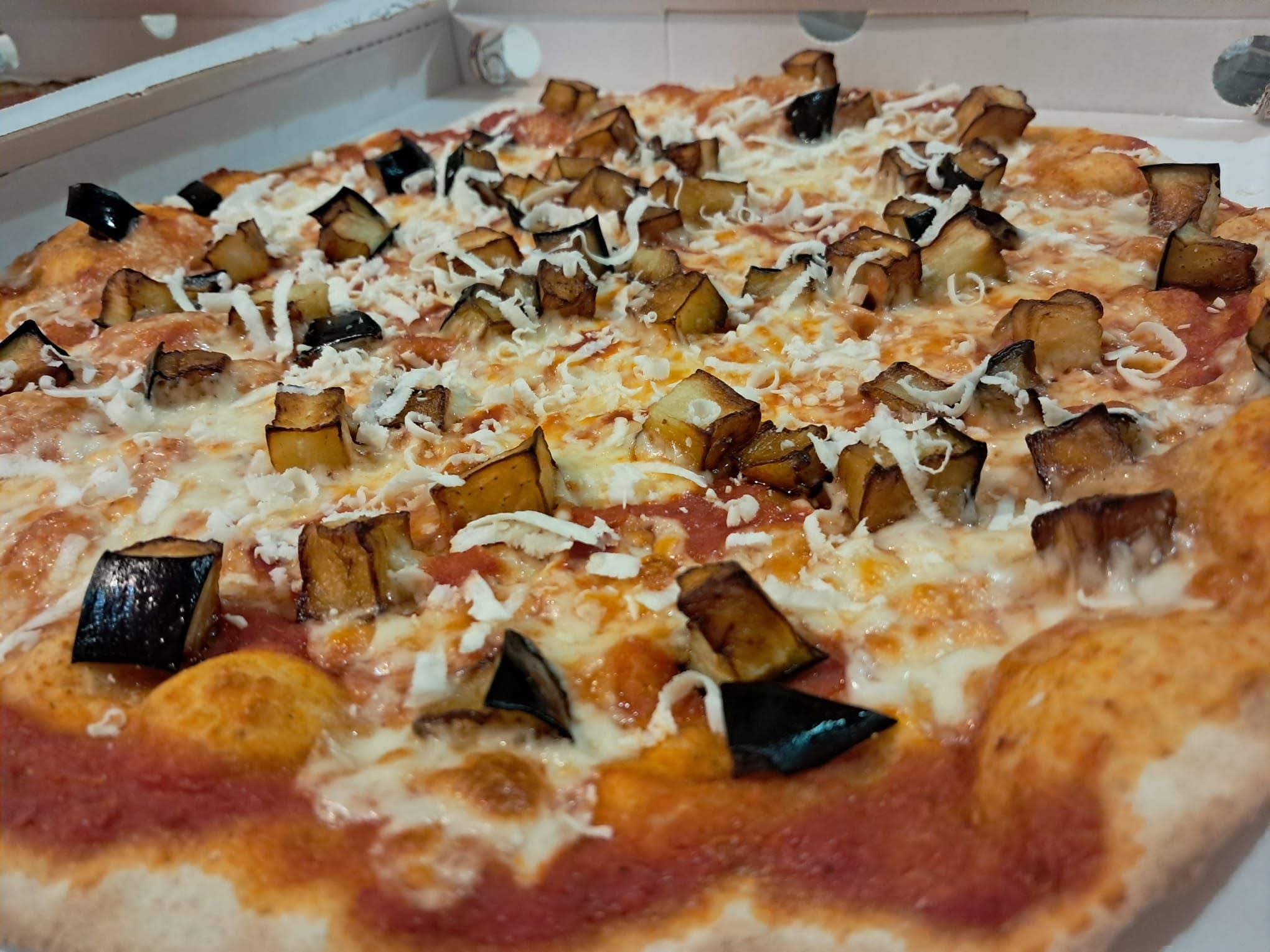 Interno accogliente della pizzeria